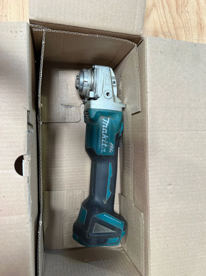 Makita DGA 521 ZX1 Akku Winkelschleifer 18 V 125 mm X-LOCK Brushless Solo - ohne Akku, ohne Ladegerät - Reparaturgerät