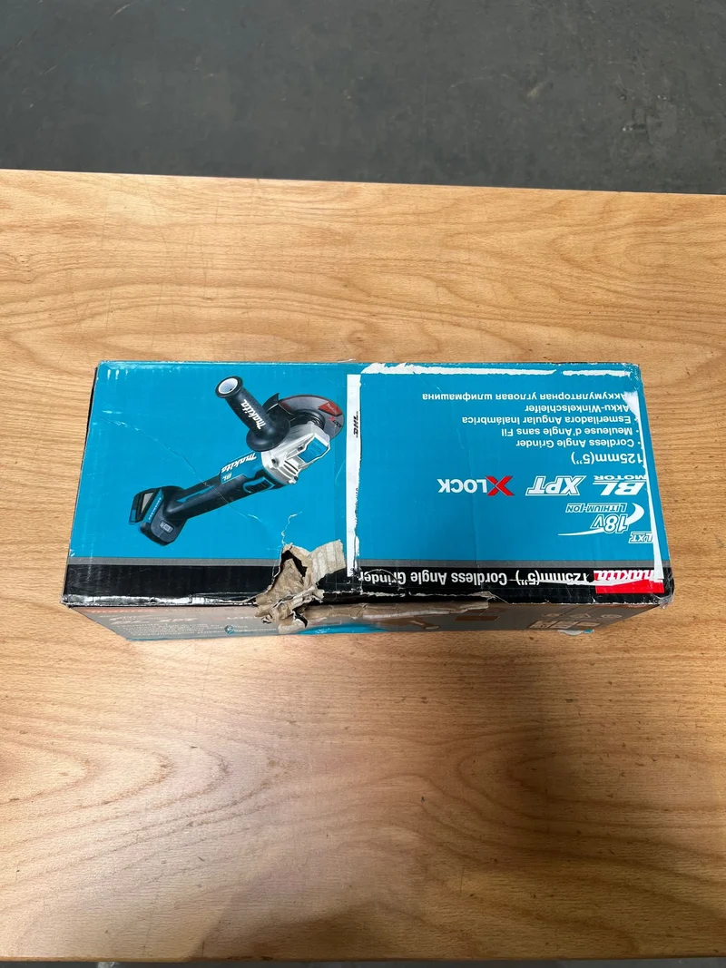 Makita DGA 521 ZX1 Akku Winkelschleifer 18 V 125 mm X-LOCK Brushless Solo - ohne Akku, ohne Ladegerät - Reparaturgerät