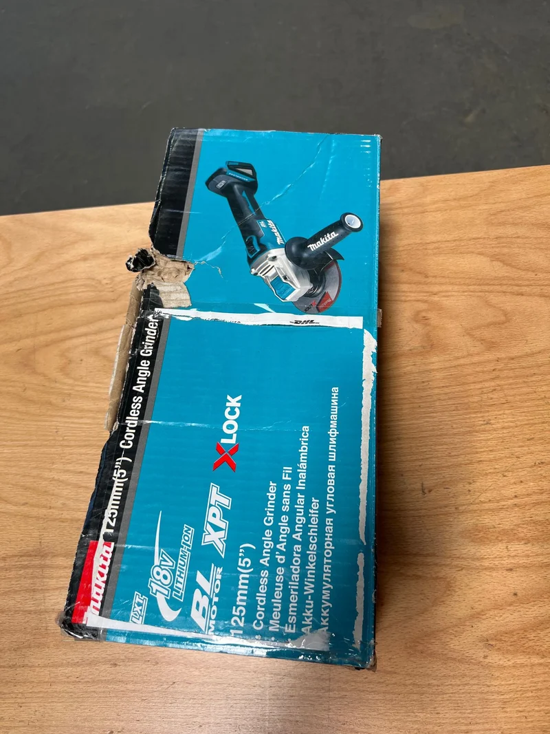 Makita DGA 521 ZX1 Akku Winkelschleifer 18 V 125 mm X-LOCK Brushless Solo - ohne Akku, ohne Ladegerät - Reparaturgerät